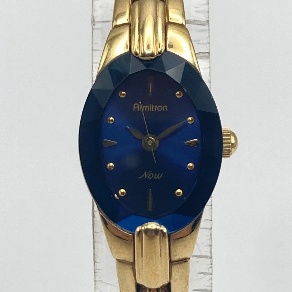 Armitron Now Women's Watch 17mm Gold Tone Blue Dial Faceted New Battery 6.75